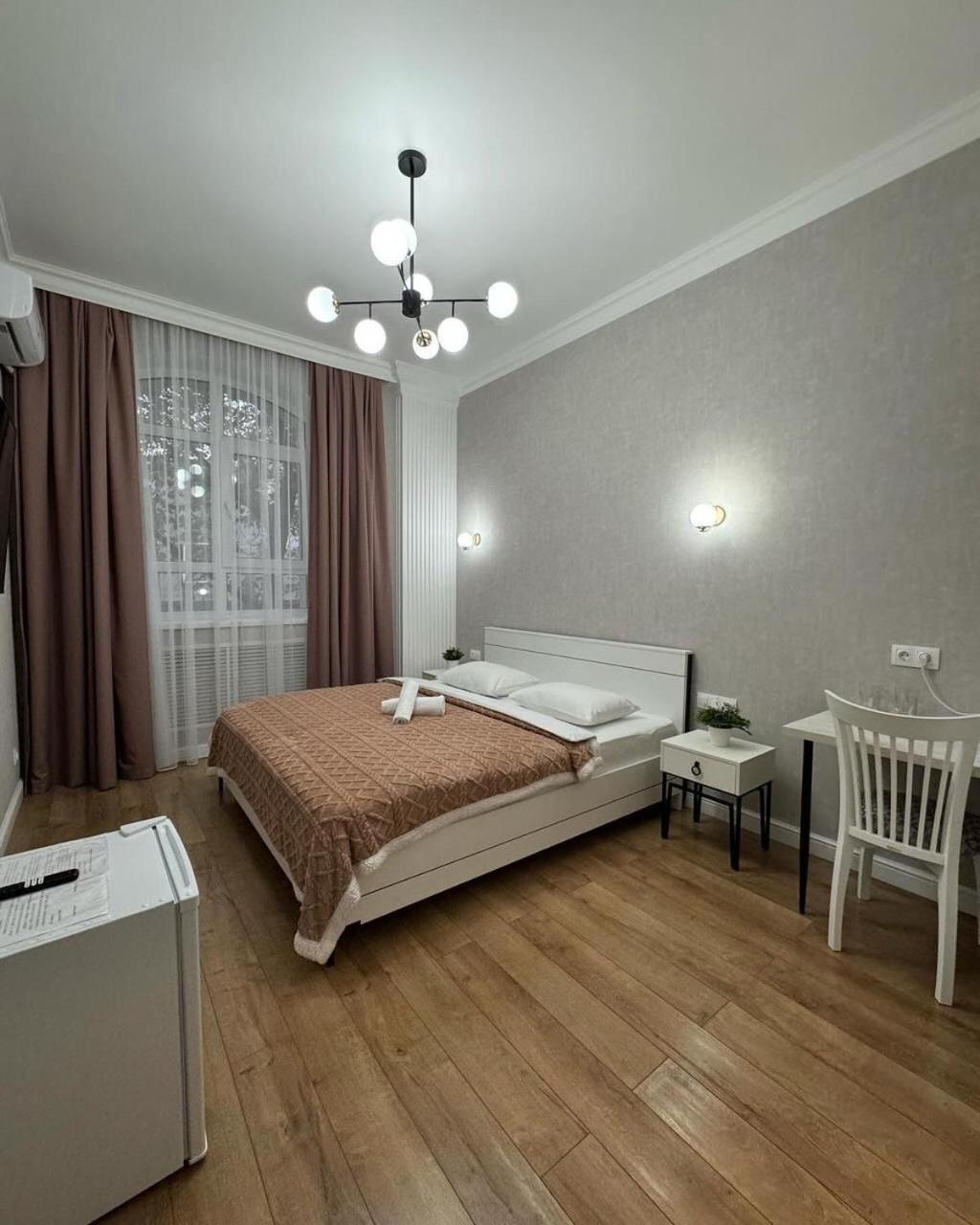 Rose Art Hotel Astana Bagian luar foto