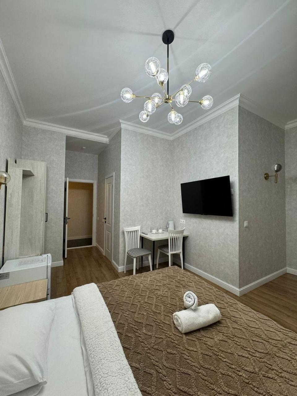 Rose Art Hotel Astana Bagian luar foto