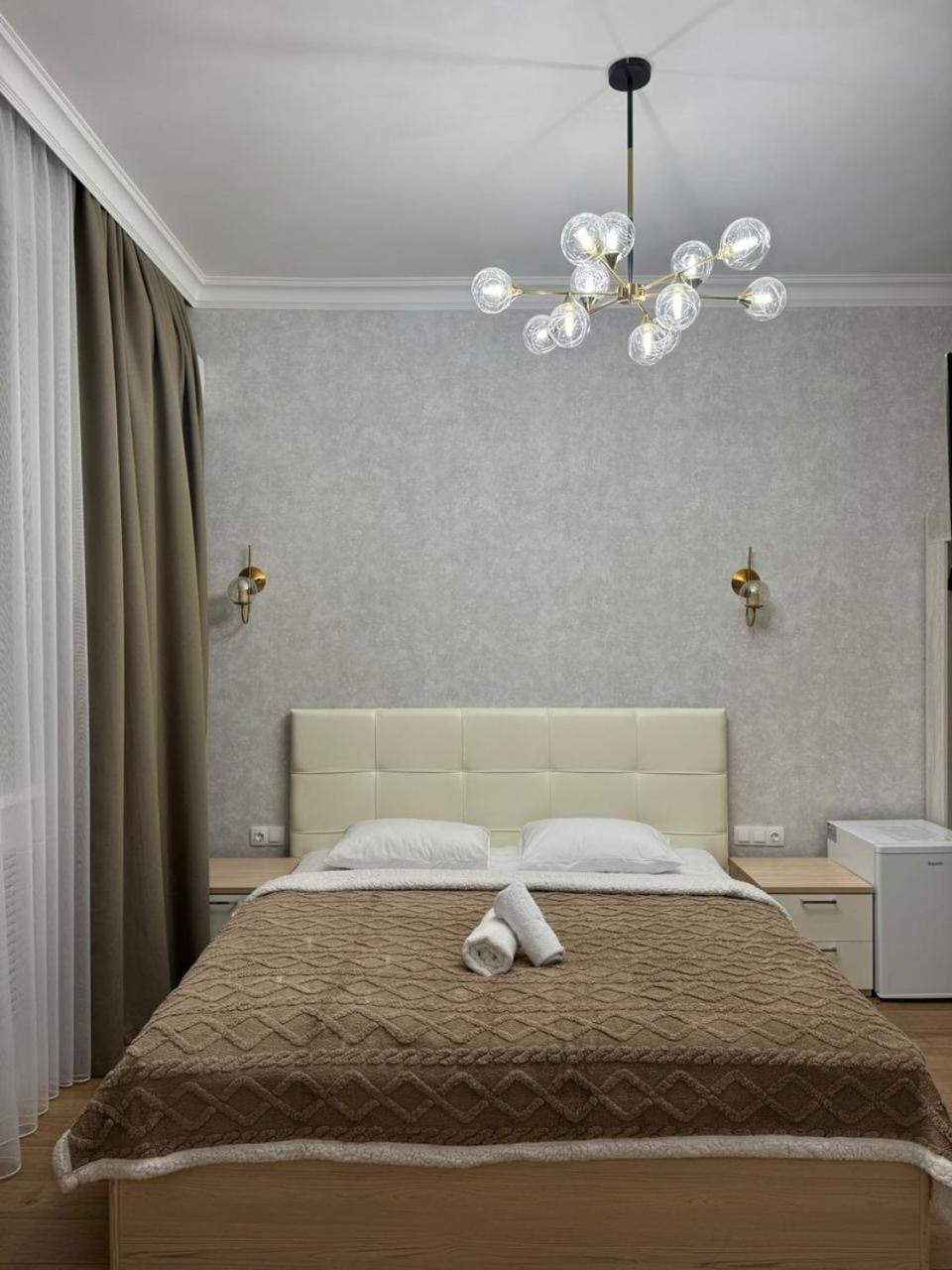 Rose Art Hotel Astana Bagian luar foto